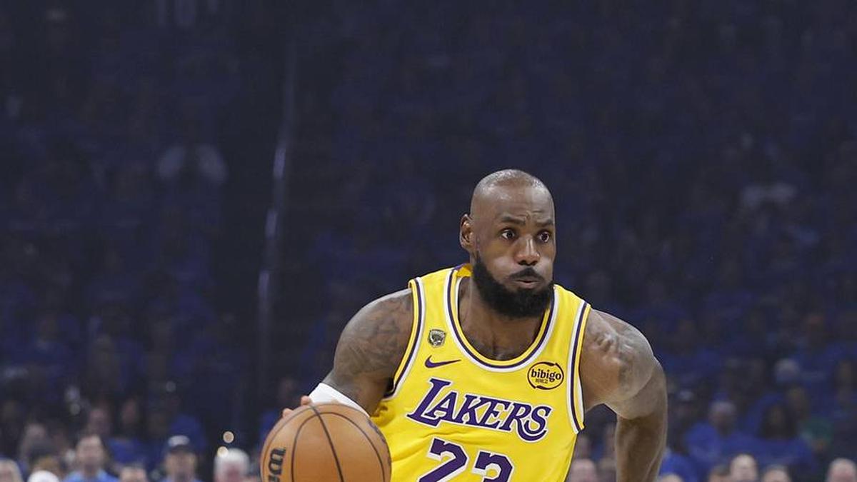  May 5, 2026; Oklahoma City, Oklahoma, USA; Los Angeles Lakers forward LeBron James (23) dribbles down the court against the Oklahoma City Thunder in the first half during game one of the second round of the 2026 NBA Playoffs at Paycom Center. | Alonzo Adams-Imagn Images 