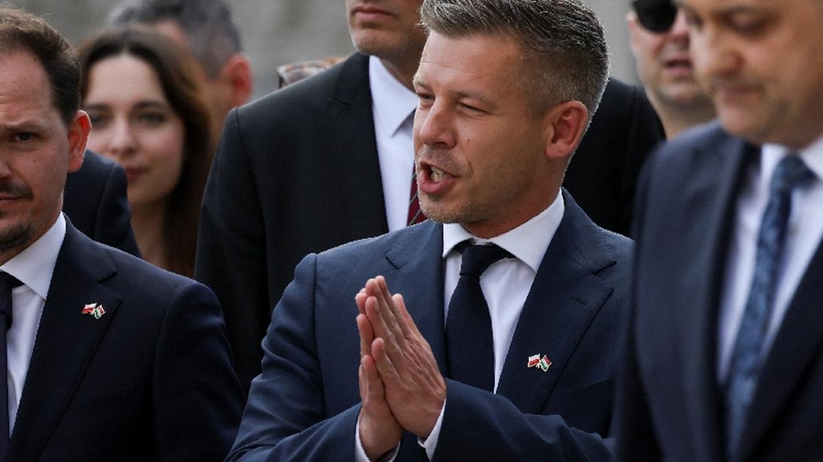 Hungary's Prime Minister Peter Magyar speaks outside the Wawel Cathedral during his first official visit, in Krakow, Poland, May 19, 2026. REUTERS/Kacper Pempel