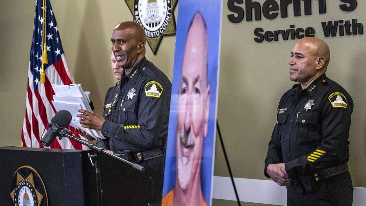 Sacramento Sheriff Jim Cooper holds a stack of victim statements during a news conference on Monday, Feb. 23, 2026, at the Sheriff's office headquarters, about the early release of David Allen Funston, who was convicted of 16 counts of kidnapping and child molestation in 1999. (Hector Amezcua/The Sacramento Bee/TNS)