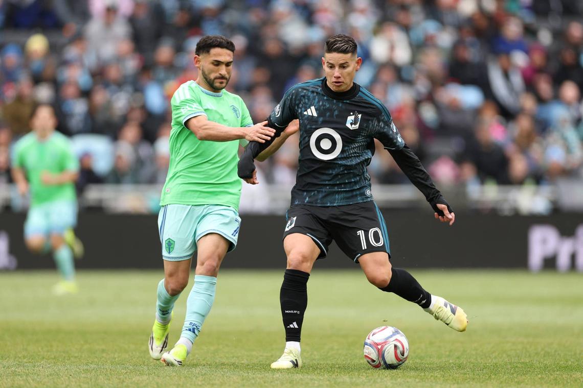  James Rodriguez controls the ball whilst under pressure from Cristian Roldan during the MLS match between Minnesota United FC and Seattle Sounders FC. Photo by David Berding/MLS via Getty Images