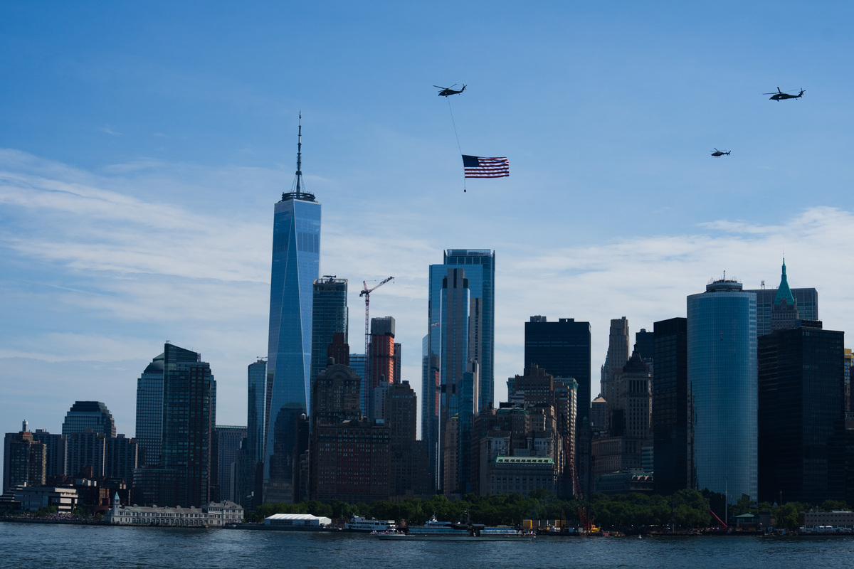 A helicopter flies above New York for the boat parade July 4, 2026. America celebrates the 250th anniversary of its independence today, with people from one end of the country to the other marking the milestone with fireworks, parades and concerts. (Juan Arredondo/The New York Times)