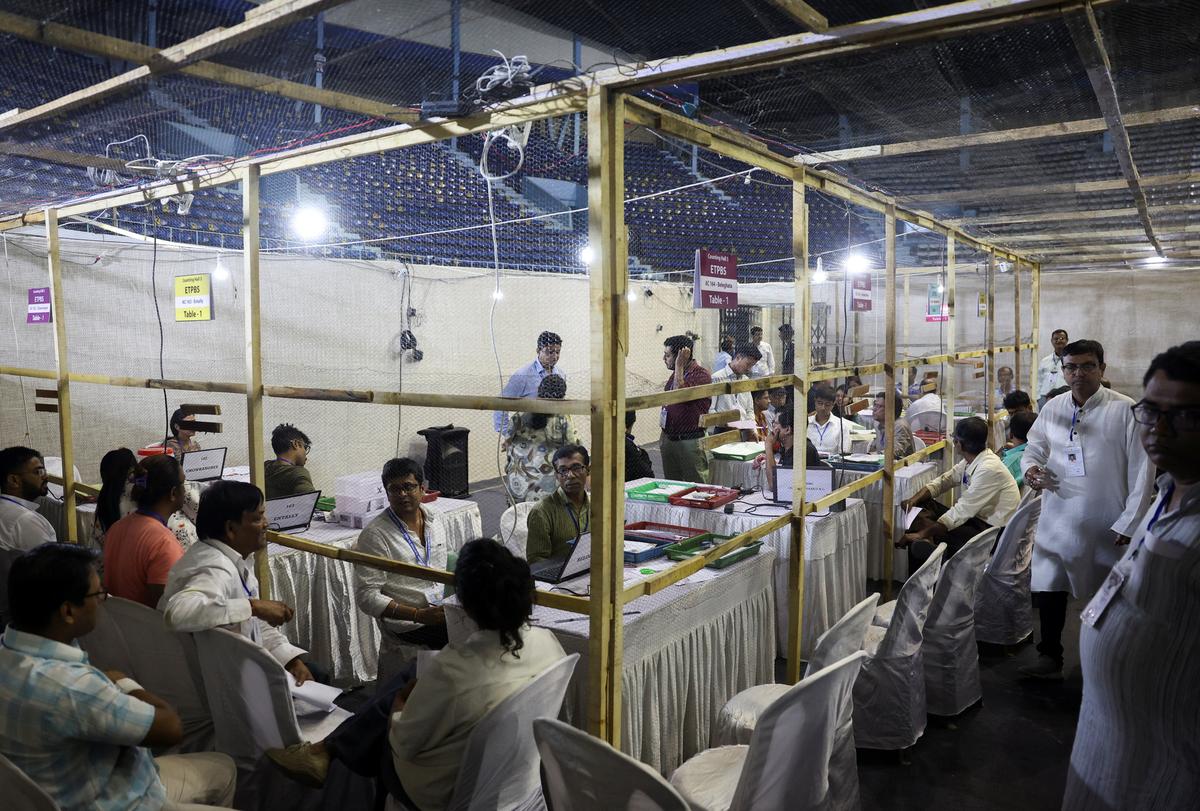 Election officials count votes of the West Bengal state legislative assembly elections, inside a counting centre in Kolkata, India May 4, 2026. REUTERS/Sahiba Chawdhary
