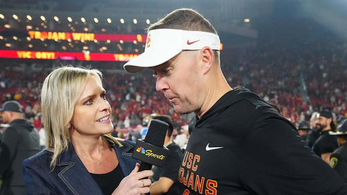  Nov 29, 2025; Los Angeles, California, USA; Southern California Trojans head coach Lincoln Riley (right) is interviewed by NBC Sports reporter Kathryn Tappen after the game against the UCLA Bruins at United Airlines Field at Los Angeles Memorial Coliseum. Mandatory Credit: Kirby Lee-Imagn Images | Kirby Lee-Imagn Images 