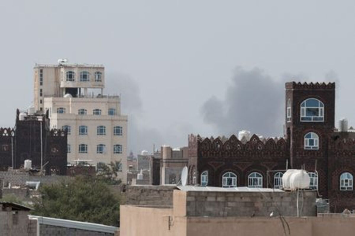 Smoke rises after reports of an airstrike hitting near the Sanaa International Airport, as seen from Sanaa, Yemen, July 13, 2026. REUTERS/Khaled Abdullah