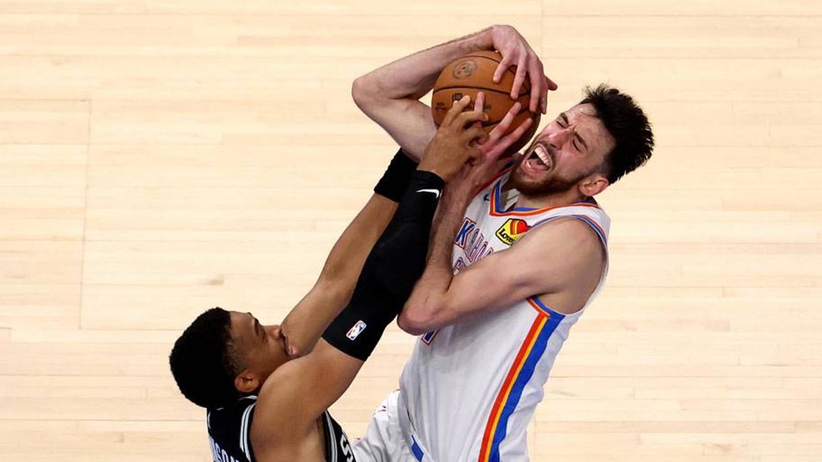  Spurs forward Keldon Johnson defends Thunder center Chet Holmgren in Game 5 of the Western Conference finals. | Brett Rojo-Imagn Images 