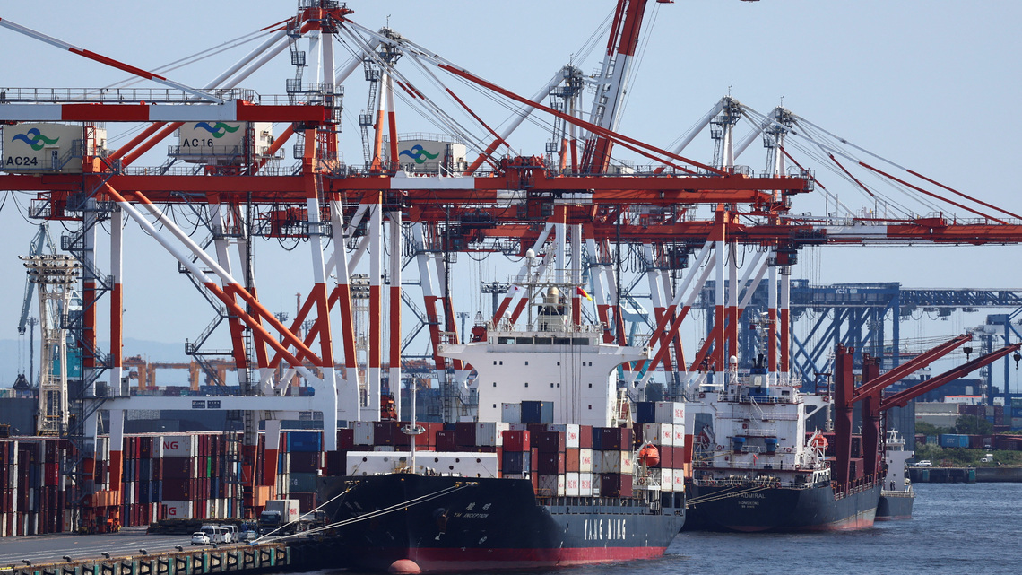 Japan's exports surge on chips demand, imports hit record on oil costs 
