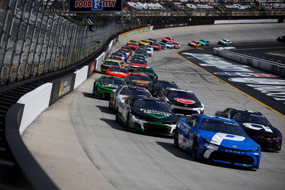  BRISTOL, TENNESSEE - APRIL 13: Denny Hamlin, driver of the #11 Progressive Toyota, leads during the NASCAR Cup Series Food City 500 at Bristol Motor Speedway on April 13, 2025 in Bristol, Tennessee. (Photo by Sean Gardner/Getty Images) 