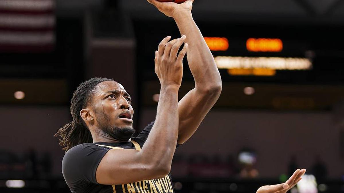  Nov 27, 2024; Columbia, Missouri, USA; Lindenwood Lions guard Jadis Jones (10) shoots the ball against Missouri Tigers guard Tony Perkins (12) during the first half at Mizzou Arena. Mandatory Credit: Jay Biggerstaff-Imagn Images | Jay Biggerstaff-Imagn Images 