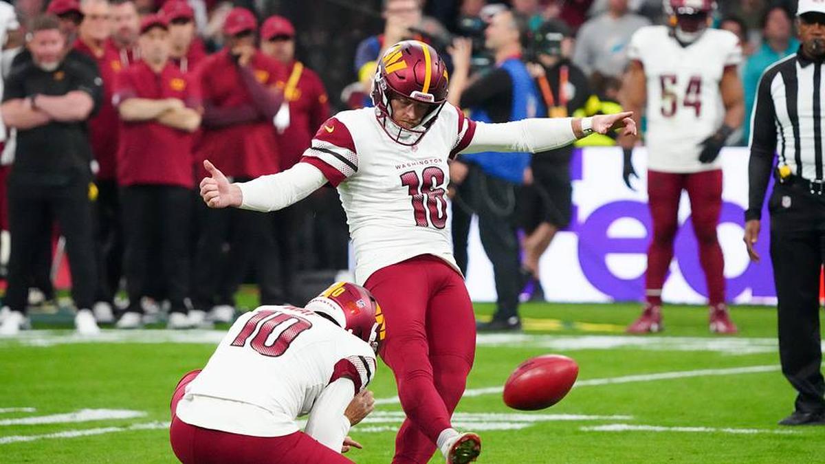  Nov 16, 2025; Madrid, Spain; Washington Commanders place kicker Matt Gay (16) kicks a field goal against the Miami Dolphins in the first quarter during the 2025 NFL Madrid Game at Santiago Bernabeu Stadium. Mandatory Credit: Kirby Lee-Imagn Images | Kirby Lee-Imagn Images 