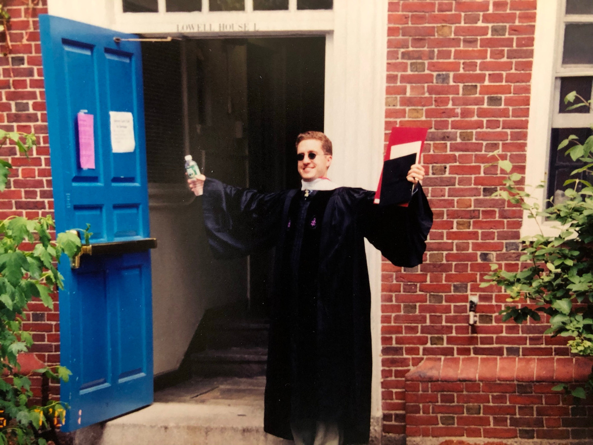 Dan Markel, who earned his bachelor's degree and doctorate in law from Harvard University, poses for a graduation photo outside the Lowell House, where he lived as an undergraduate student.