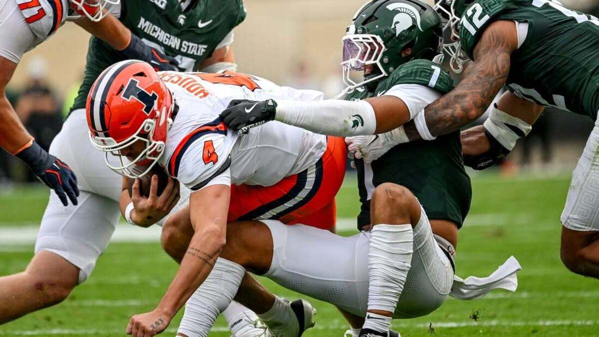 Illinois holds off Michigan State, prevails in OT