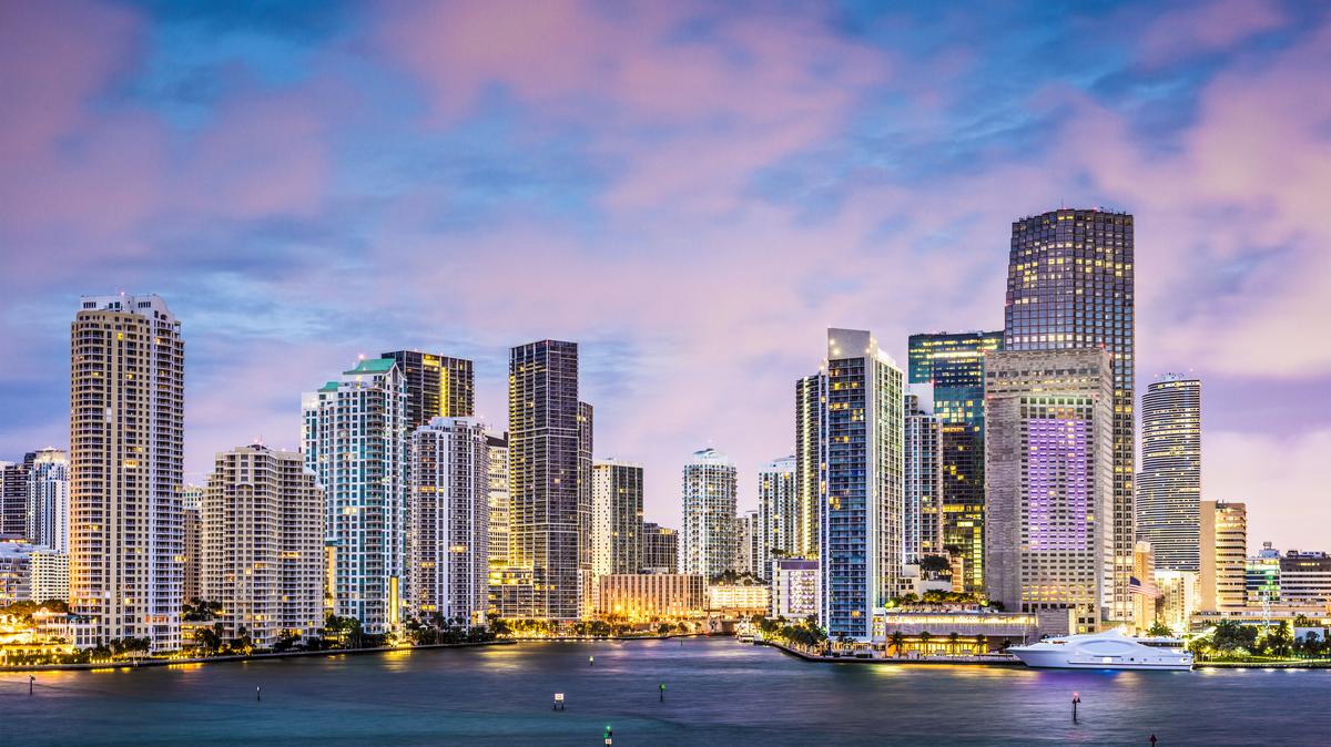 Stock image: a view of the Miami skyline along Brickell Key and the Miami River. 