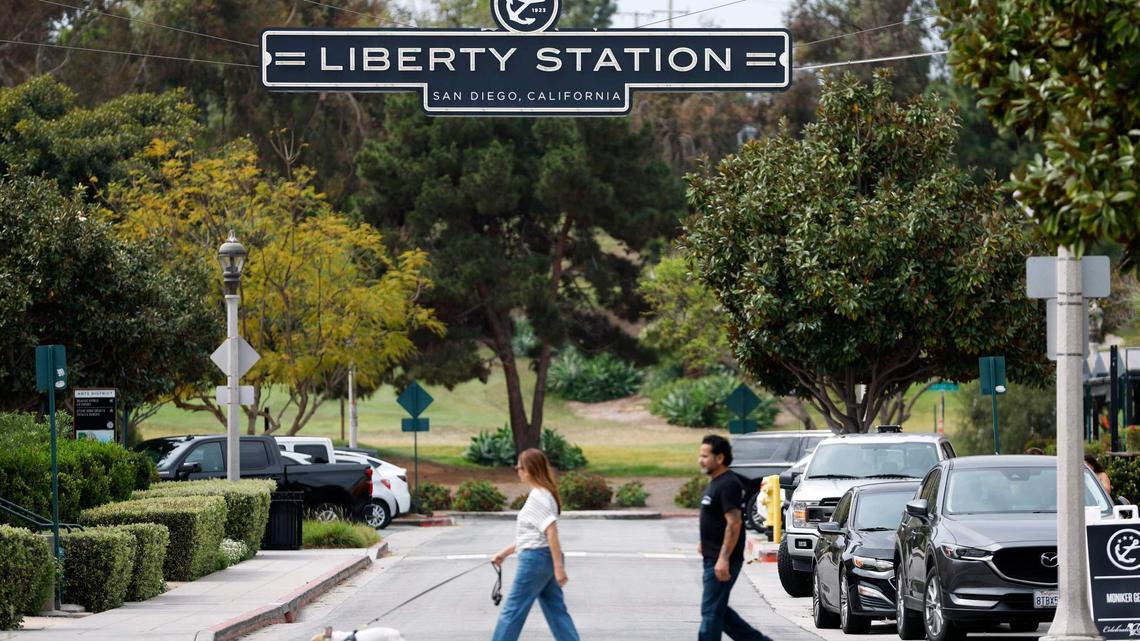 People walk through Liberty Station on March 31, 2026, in San Diego.   (K.C. Alfred / The San Diego Union-Tribune)