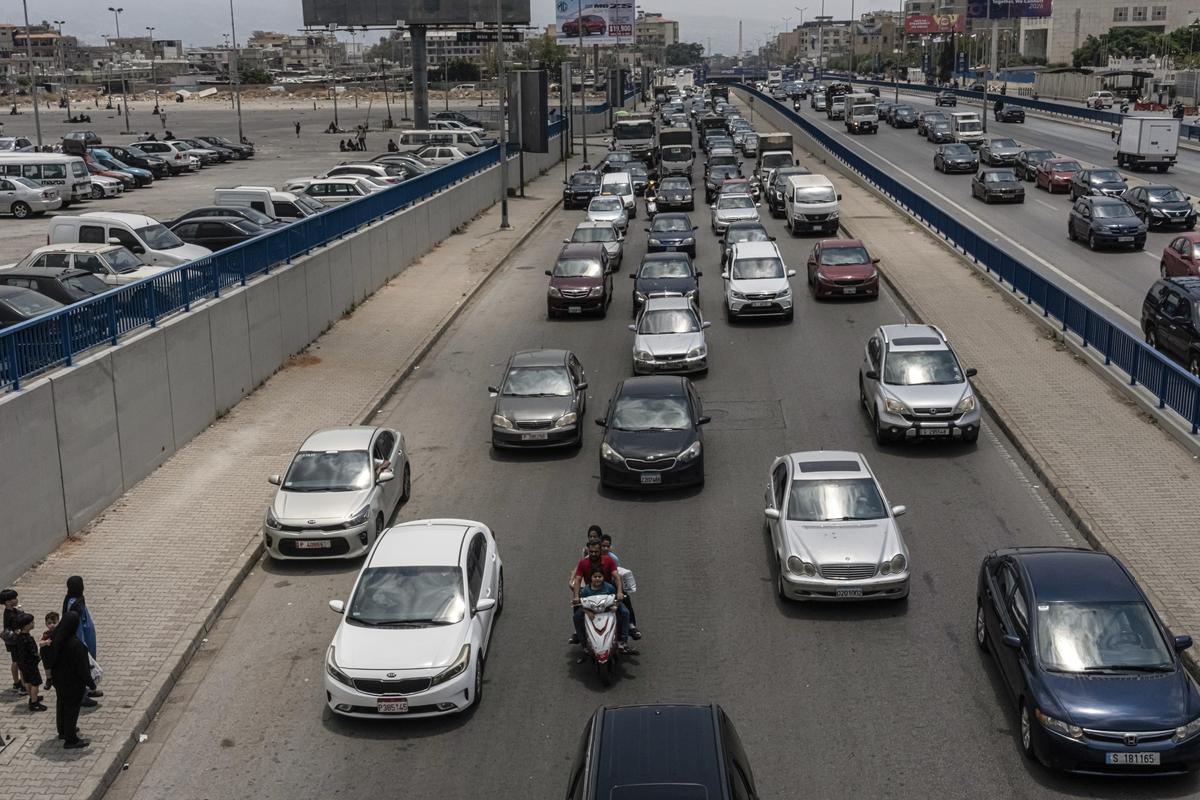 Local residents flee the suburbs south of Beirut, Lebanon, after Israel warned the area would be targeted with attacks on Monday morning, June 1, 2026. For many, urgently leaving the area, known as the Dahiyeh, has become a well-worn routine. (Daniel Berehulak /The New York Times)