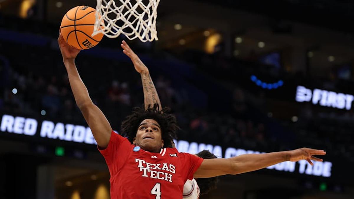  Mar 22, 2026; Tampa, FL, USA; Texas Tech Red Raiders guard Christian Anderson (4) goes to the basket against the Alabama Crimson Tide in the second half during a second round game of the men's 2026 NCAA Tournament at Benchmark International Arena. Mandatory Credit: Matt Pendleton-Imagn Images | Matt Pendleton-Imagn Images 