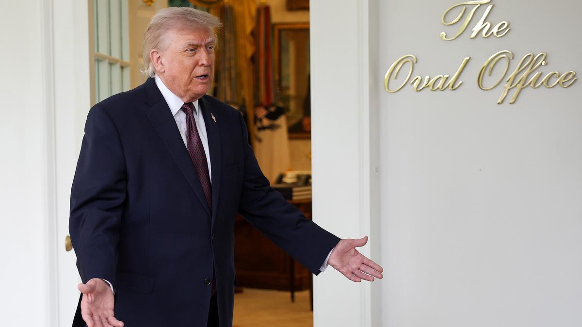 President Donald Trump speaks to the press during an event outside the Oval Office of the White House on April 13, 2026. Legal experts argue Trump cannot sue or settle with the DOJ he controls; courts may dismiss collusive claims to protect taxpayers and preserve Article III limits.
