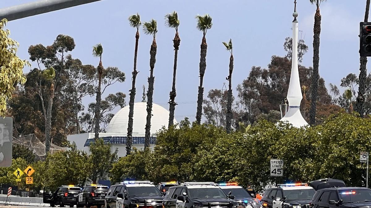 Police cordon off an area close to the Islamic Center of San Diego after reports of an active shooter on Monday. Three people were killed, authorities said, and two teenage suspects were found dead of apparent self-inflicted gunshot wounds in a vehicle nearby.