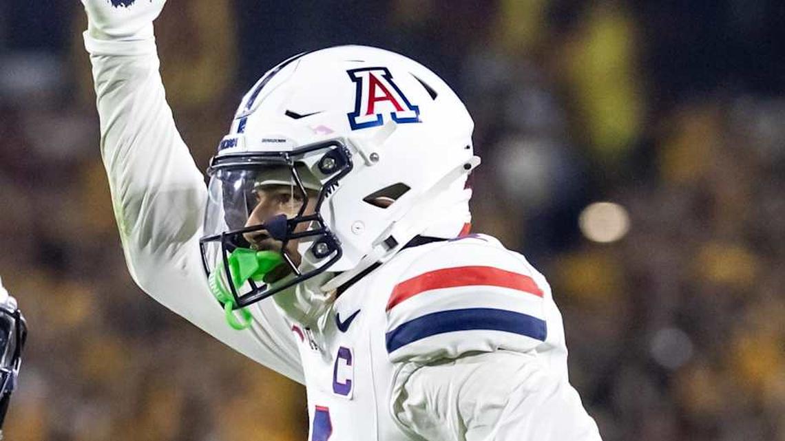  Nov 28, 2025; Tempe, Arizona, USA; Arizona Wildcats defensive back Treydan Stukes (2) celebrates with defensive back Ayden Garnes (9) after an interception against Arizona State Sun Devils in the second half during the 99th Territorial Cup at Mountain America Stadium. Mandatory Credit: Mark J. Rebilas-Imagn Images | Mark J. Rebilas-Imagn Images 