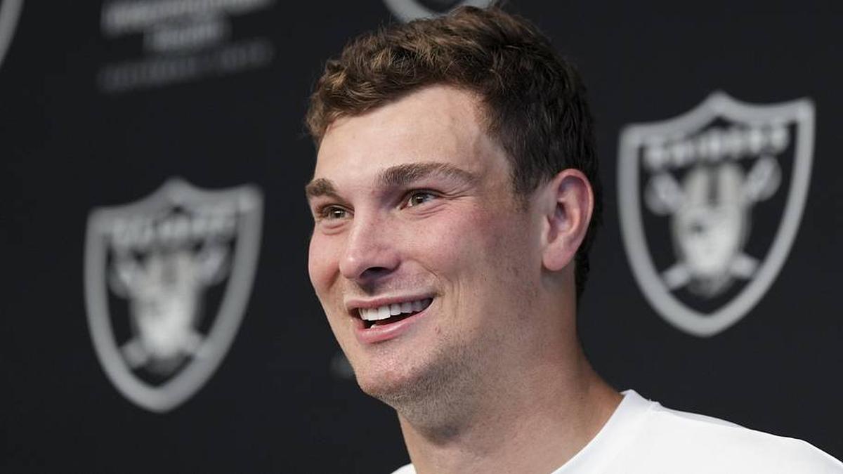  May 2, 2026; Henderson, NV, USA; Las Vegas Raiders quarterback Fernando Mendoza (15) speaks during a news conference at the team's Rookie Minicamp at Intermountain Health Performance Center. Mandatory Credit: Candice Ward-Imagn Images | Candice Ward-Imagn Images 