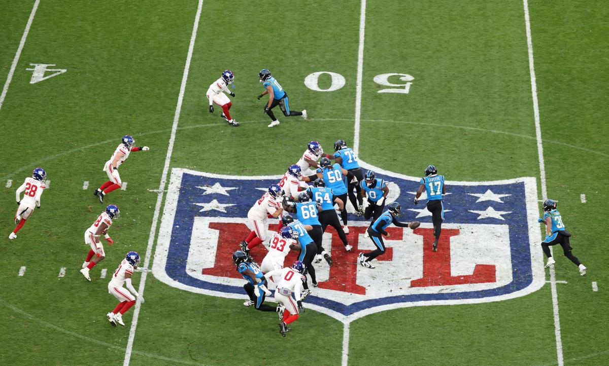 Carolina Panthers players. MUNICH, GERMANY - NOVEMBER 10: A general view as Bryce Young of Carolina Panthers runs with the ball during the NFL Munich Game 2024 between New York Giants and Carolina Panthers at Allianz Arena on November 10, 2024 in Munich, Germany. Panthers RB Miles Sanders carted off field.