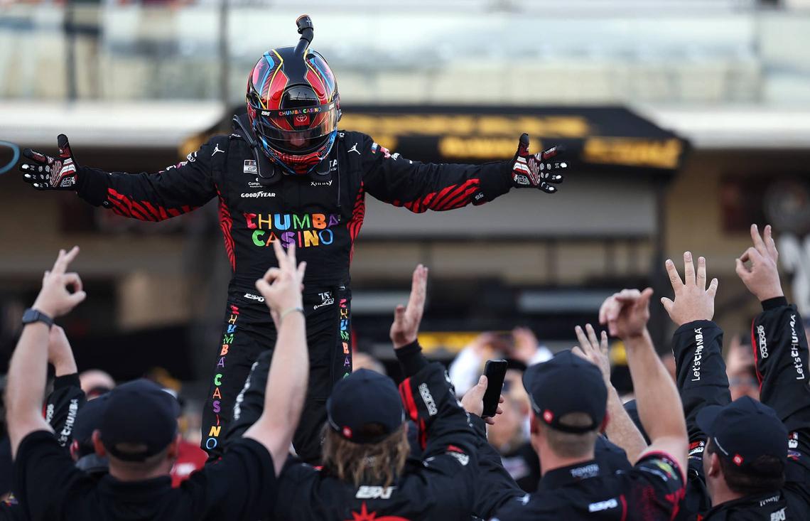  Tyler Reddick and his team celebrate after a three-peat to start the 2026 season. James Gilbert/Getty Images