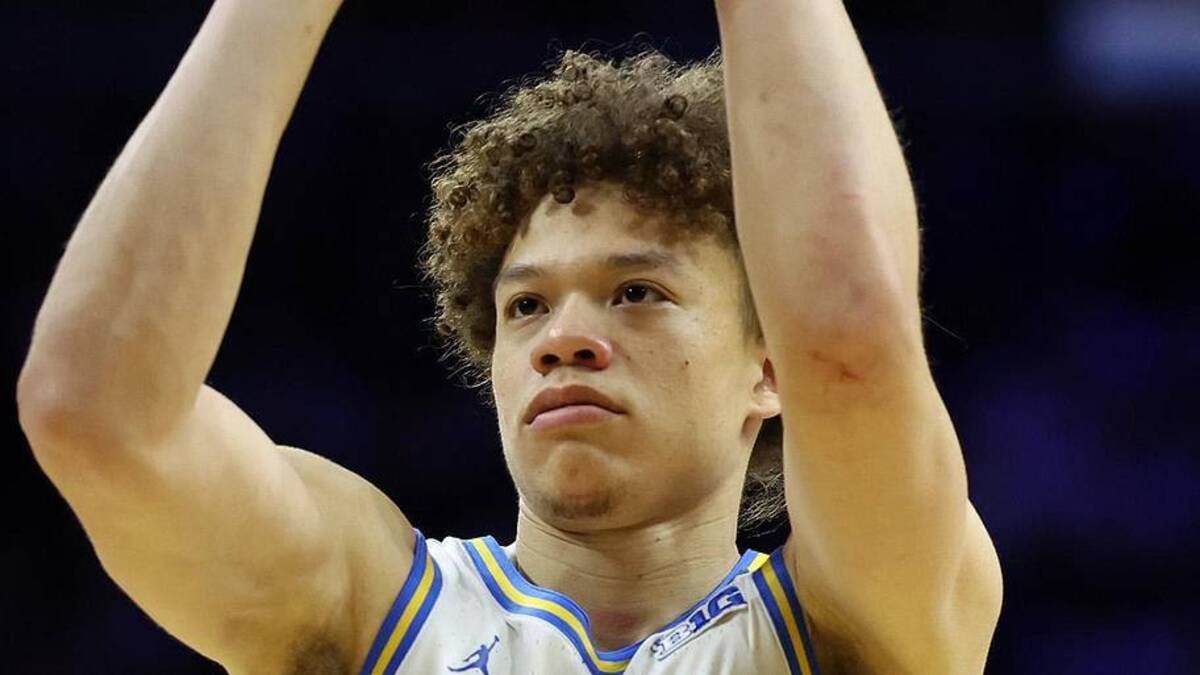  Mar 20, 2026; Philadelphia, PA, USA; UCLA Bruins guard Trent Perry (0) shoots the ball in the second half during a first round game of the men's 2026 NCAA Tournament at Xfinity Mobile Arena. Mandatory Credit: Bill Streicher-Imagn Images | Bill Streicher-Imagn Images 