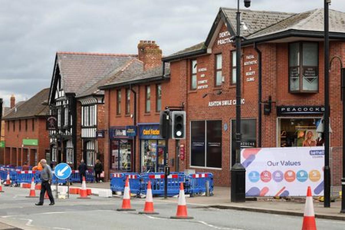 People walk along the high street, ahead of the Makerfield by-election, triggered by Labour MP Josh Simons, who resigned as a minister in March, in Ashton-in-Makerfield, Britain, May 20, 2026. REUTERS/Temilade Adelaja