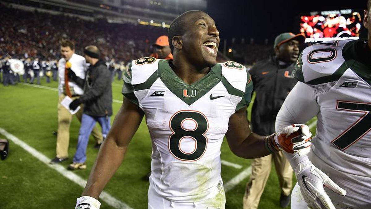  Oct 23, 2014; Blacksburg, VA, USA; Miami Hurricanes running back Duke Johnson (8) runs off the field at halftime at Lane Stadium. Mandatory Credit: Bob Donnan-Imagn Images | Bob Donnan-Imagn Images 