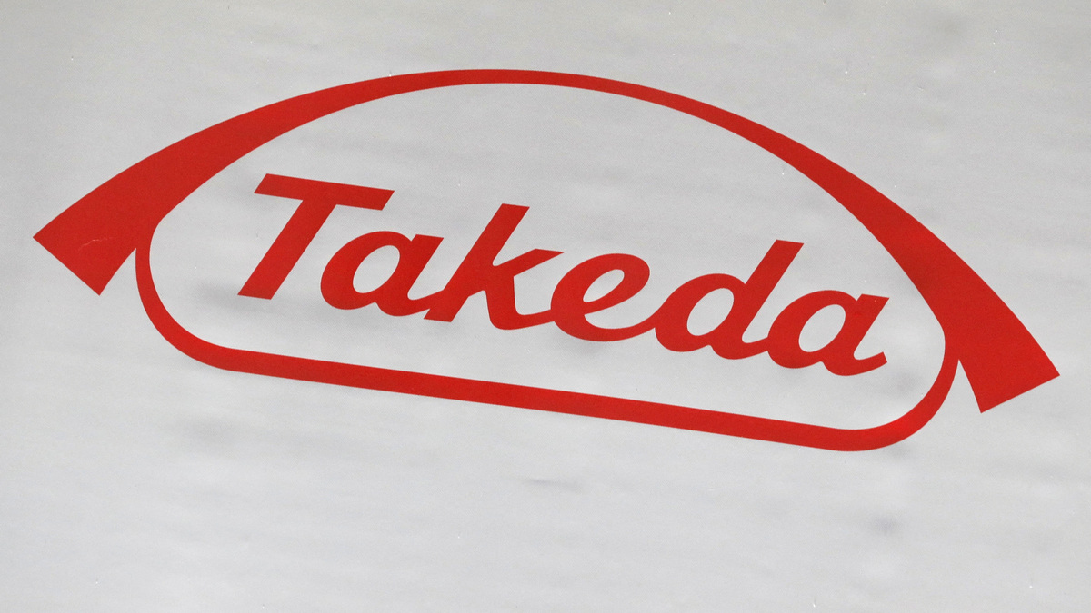 FILE PHOTO: The logo of Takeda Pharmaceutical Co. is displayed at the company's news conference venue in Tokyo, Japan May 9, 2018.  REUTERS/Kim Kyung-Hoon/File Photo