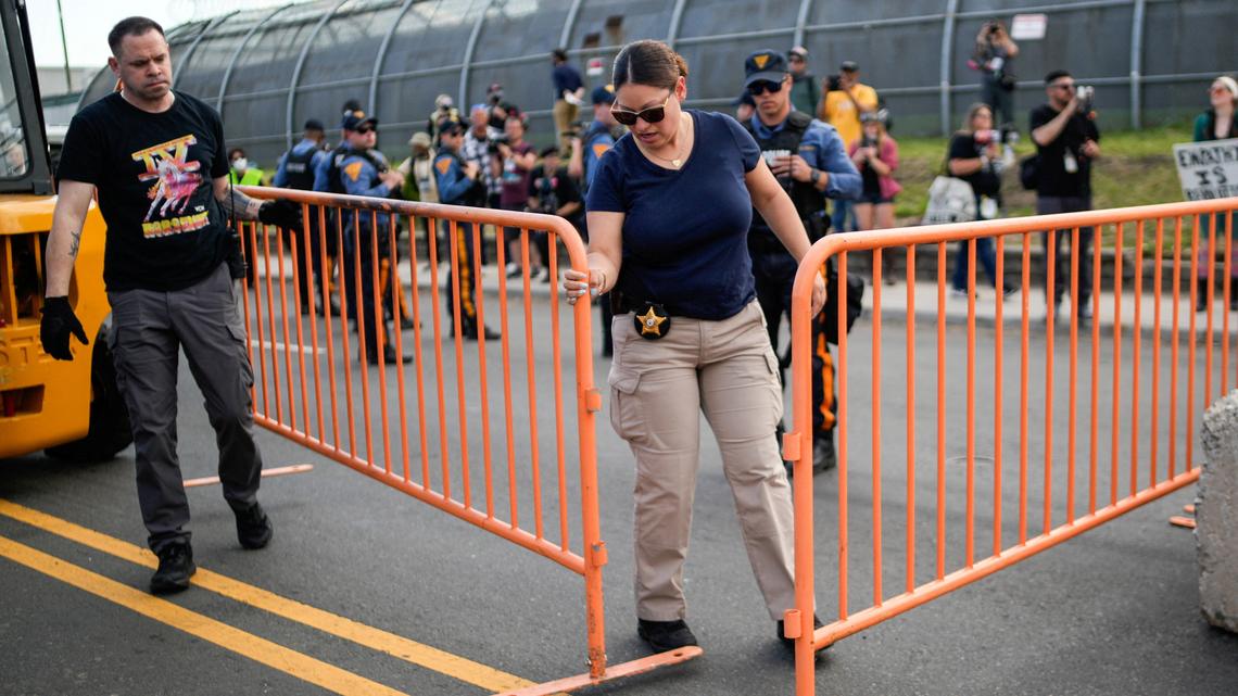 New Jersey state police assert control outside migrant detention center 