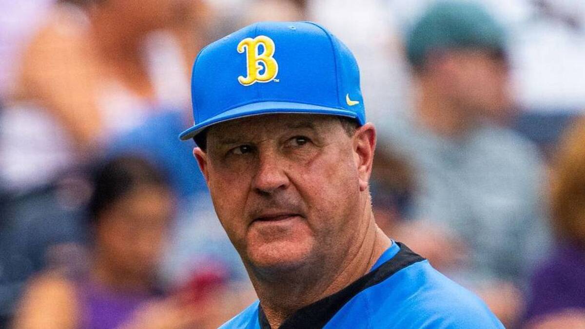  Jun 16, 2025; Omaha, Neb, USA; UCLA Bruins head coach John Savage walks off the field before the game against the LSU Tigers at Charles Schwab Field. Mandatory Credit: Dylan Widger-Imagn Images | Dylan Widger-Imagn Images 