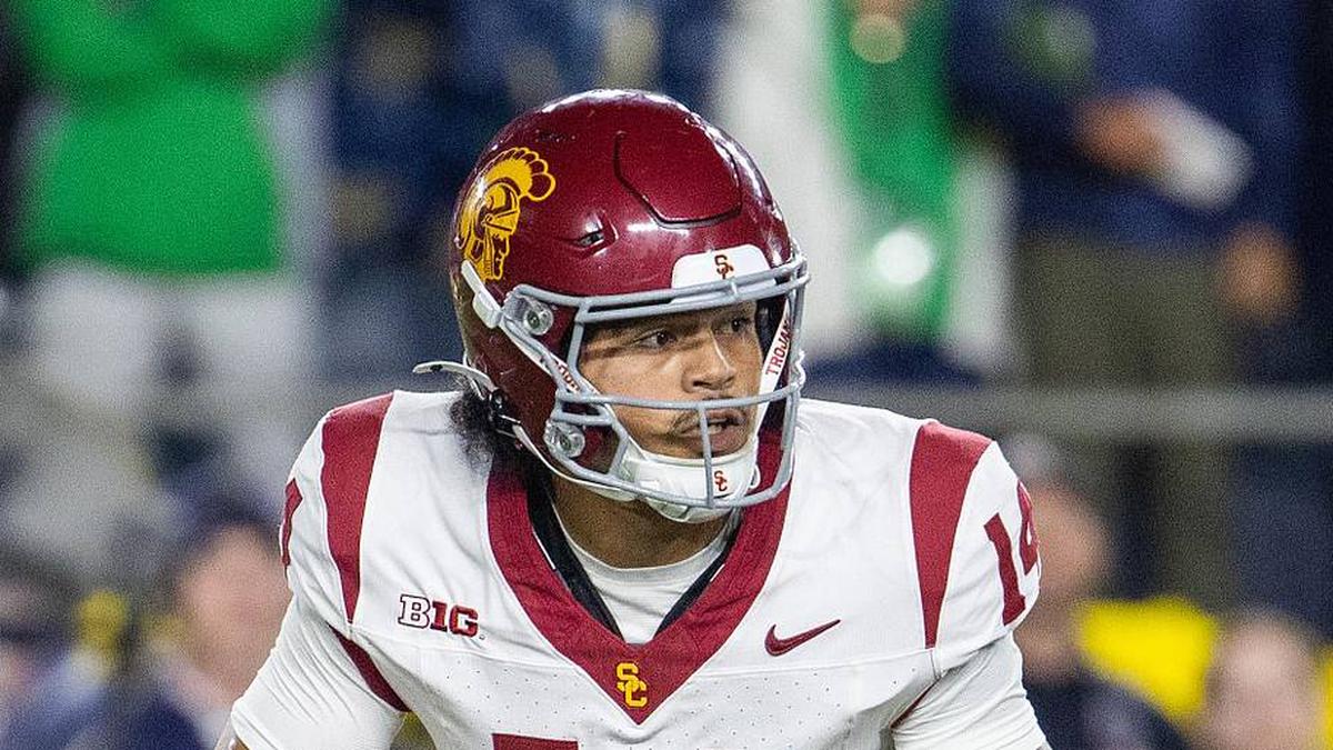 Oct 18, 2025; South Bend, Indiana, USA; Southern California Trojans quarterback Jayden Maiava (14) drops back to throw the ball in the first half against the Notre Dame Fighting Irish at Notre Dame Stadium. Mandatory Credit: Trevor Ruszkowski-Imagn Images | Trevor Ruszkowski-Imagn Images 