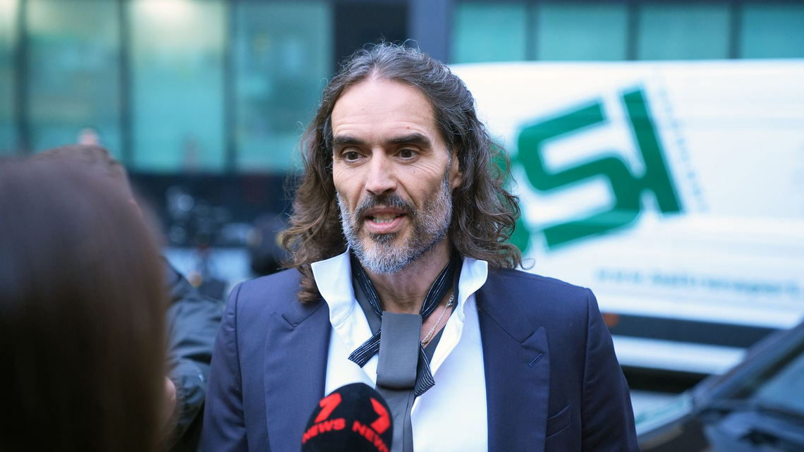 Russell Brand calls rape claims ‘devastating' as he testifies at trial 