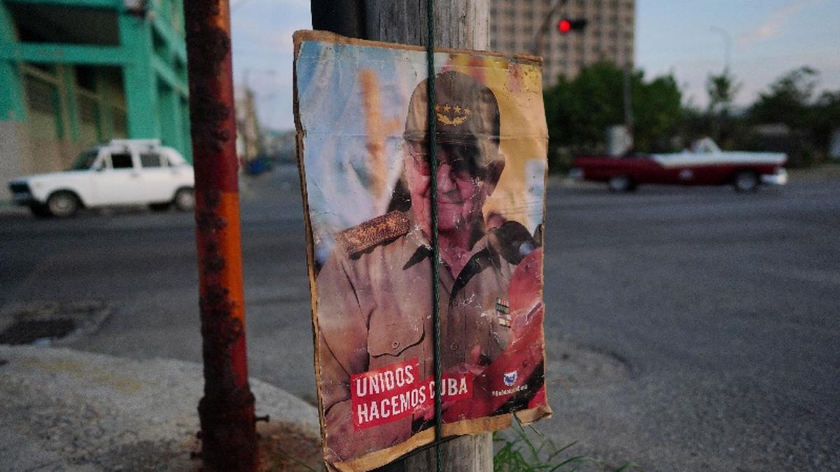 An image of former Cuban President Raul Castro hangs on the street in Havana, Cuba, May 9, 2023. REUTERS/Alexandre Meneghini