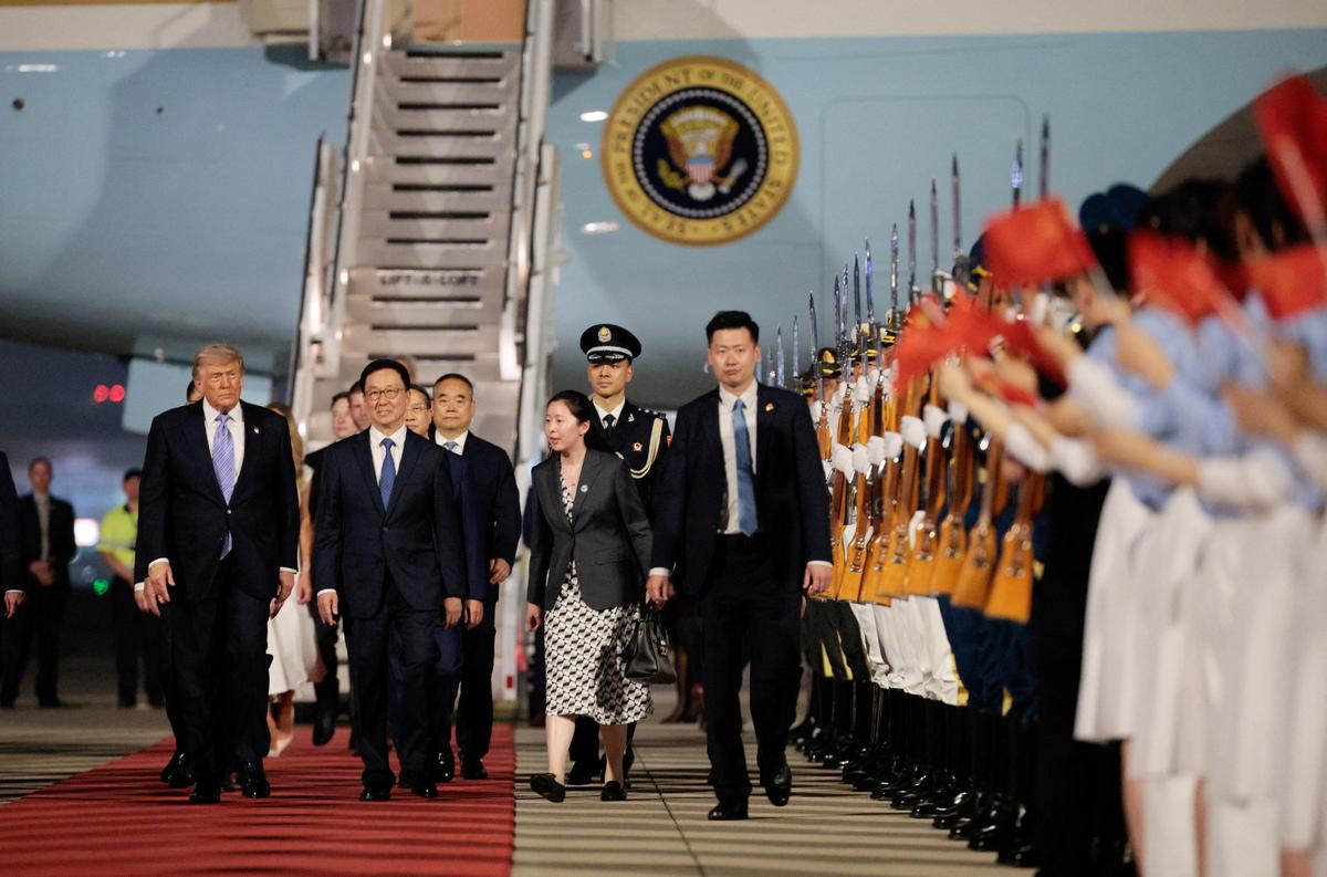 U.S. President Donald Trump participates in an arrival ceremony at Beijing Capital International Airport during his visit to the country, in Beijing, China, May 13, 2026. REUTERS/Evan Vucci