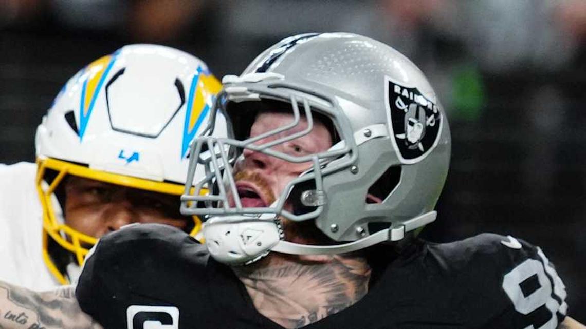  Sep 15, 2025; Paradise, Nevada, USA; Las Vegas Raiders defensive end Maxx Crosby (98) attempts to stop a pass from Los Angeles Chargers quarterback Justin Herbert (10) during the second quarter at Allegiant Stadium. Mandatory Credit: Stephen R. Sylvanie-Imagn Images | Stephen R. Sylvanie-Imagn Images 