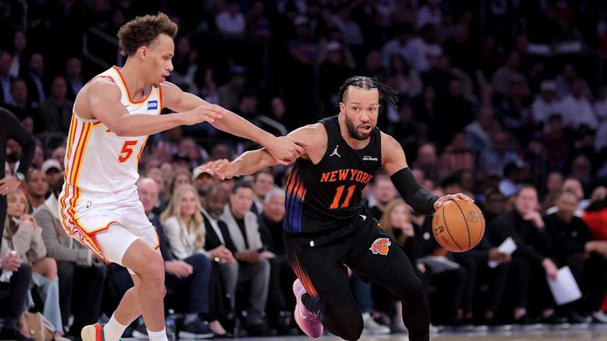  Apr 28, 2026; New York, New York, USA; New York Knicks guard Jalen Brunson (11) controls the ball against Atlanta Hawks guard Dyson Daniels (5) during the second quarter of game five of the first round of the 2026 NBA Playoffs at Madison Square Garden. | Brad Penner-Imagn Images 