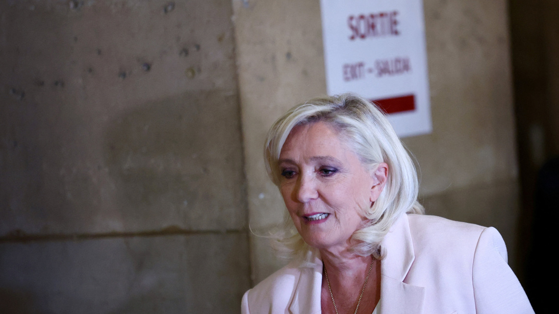 French court shortens Le Pen's ban from office but orders electronic tag 