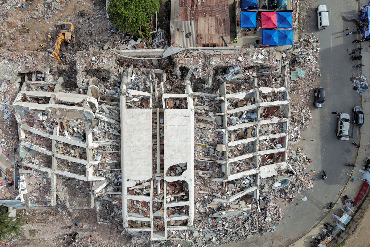 A drone view shows the remains of the apartment building where Maria Alejandra Sanz was trapped after twin earthquakes struck La Guaira, Venezuela, July 4, 2026. REUTERS/Ricardo Arduengo