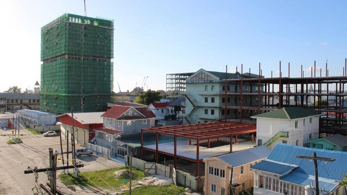 Buildings are shown under construction in Georgetown, Guyana, in August. Guyana, whose economy grew by 63% in 2022 and 43% in 2024 thanks to the oil boom, will present its case along with Venezuela over who controls the oil-rich Essequibo region during public hearings at the International Court of Justice in The Hague. File Photo by Nazima Raghubir/EPA