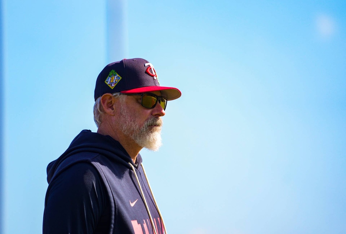  Manager Derek Shelton walks near the dugout during the Minnesota Twins first full-squad workout of spring training at Lee Health Sports Complex in Fort Myers, Fla., on Monday, Feb. 16, 2026. 