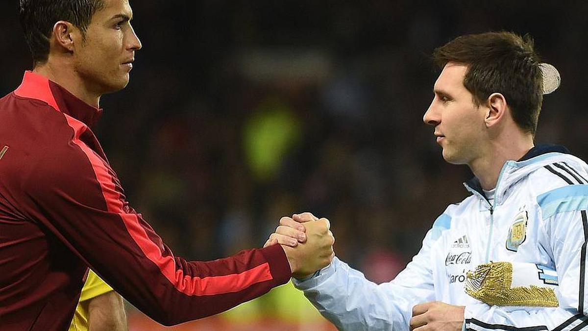  Cristiano Ronaldo (left) and Lionel Messi could meet at the 2026 World Cup. | Paul Ellis/AFP/Getty Images 
