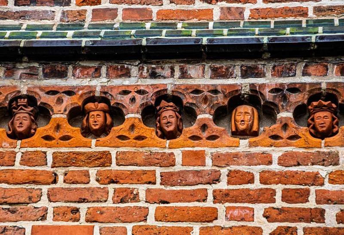  Terracotta Figurines Embedded in the Exterior Wall of St. John's Church. Photo credit: Simon Lock/MyEclecticImages 