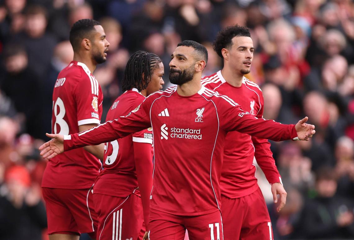  Mohamed Salah of Liverpool celebrates scoring his team's second goal with teammates during the Premier League match between Liverpool and Fulham at Anfield on April 11, 2026 in Liverpool, England. (Photo by Carl Recine/Getty Images) Photo by Carl Recine/Getty Images