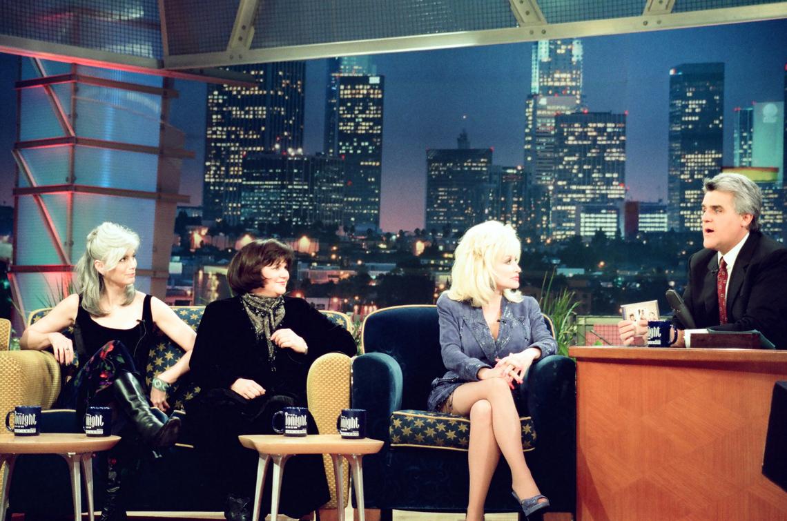 THE TONIGHT SHOW WITH JAY LENO — Episode 1542 — Pictured: (l-r) Musicians Emmylou Harris, Linda Ronstadt, Dolly Parton, host Jay Leno during an interview on February 9, 1999Getty