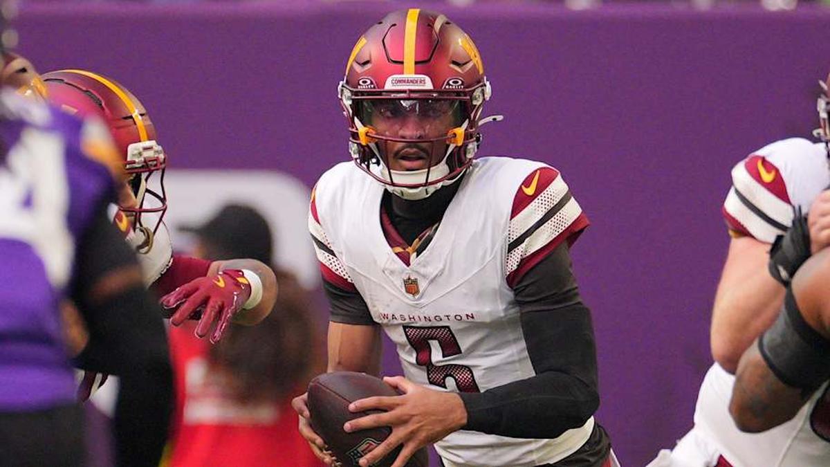  Dec 7, 2025; Minneapolis, Minnesota, USA; Washington Commanders quarterback Jayden Daniels (5) drops back to pass against the Minnesota Vikings during the first half at U.S. Bank Stadium. Mandatory Credit: Brad Rempel-Imagn Images | Brad Rempel-Imagn Images 