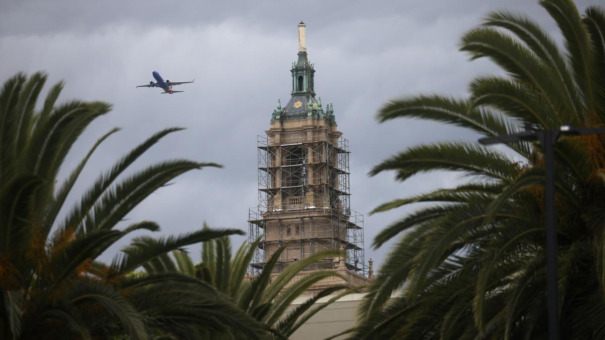 A plane takes off over the Bank of Italy building in downtown San Jose, Calif., on Monday, April 20, 2026. (Nhat V. Meyer/Bay Area News Group)
