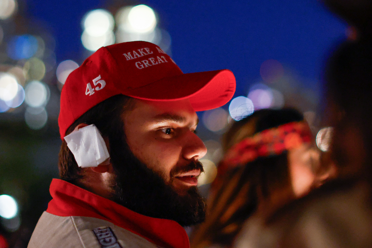  A man wears a MAGA hat and a bandaged ear at the New York Young Republican Club’s MAGAWEEN party on October 26, 2024. 
