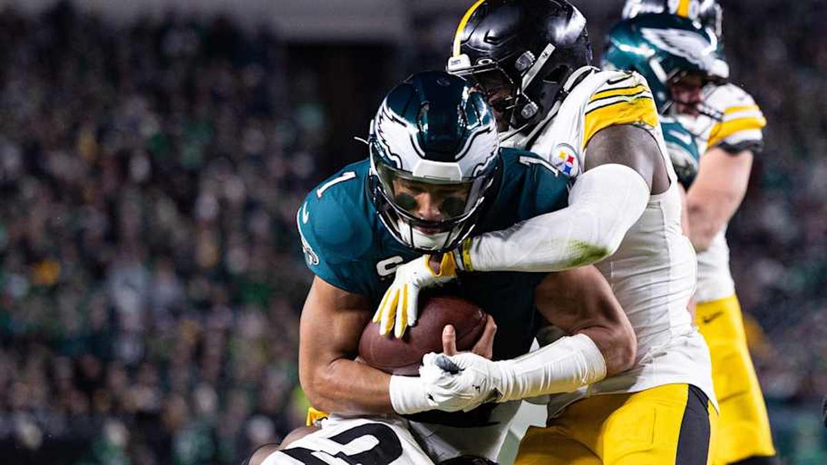  Dec 15, 2024; Philadelphia, Pennsylvania, USA; Philadelphia Eagles quarterback Jalen Hurts (1) is tackled on the two yard line by Pittsburgh Steelers linebacker Patrick Queen (6) and safety Damontae Kazee (23) during the second quarter at Lincoln Financial Field. Mandatory Credit: Bill Streicher-Imagn Images | Bill Streicher-Imagn Images 