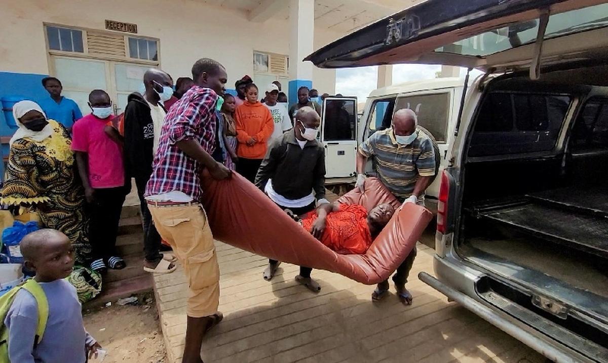 A man is carried from an ambulance as he arrives at Bunia General Referral Hospital following confirmation of an Ebola outbreak involving the Bundibugyo strain in Bunia, Ituri province, Democratic Republic of Congo, May 16, 2026.  Picture taken with a mobile phone. REUTERS/Victoire Mukenge